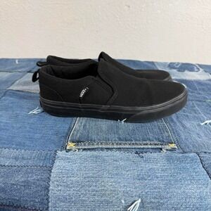 Black Vans slip on trainers